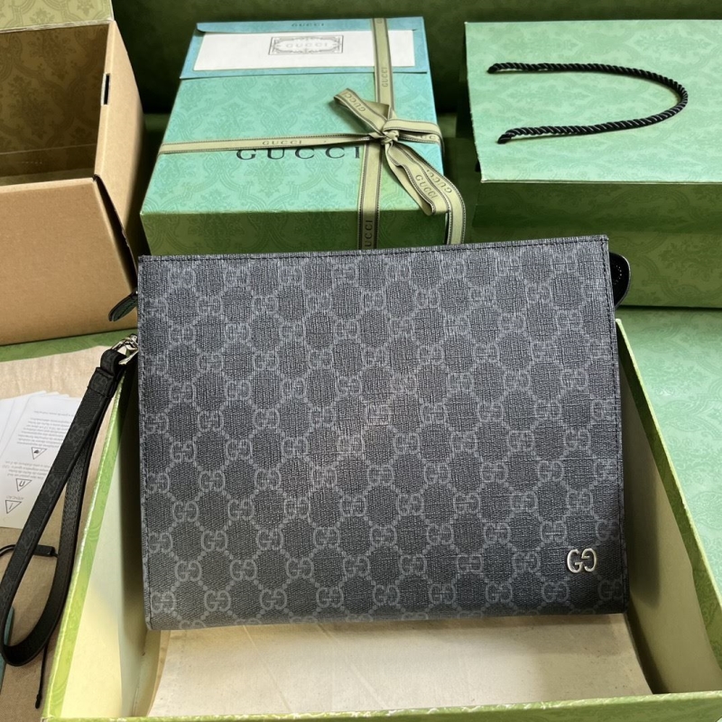 G*u*i clutch bags